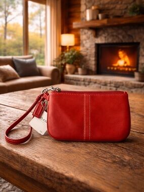 Coach Burnt Orange  Leather Wristlet NWT